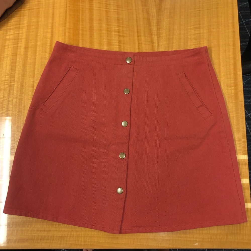 Francesca’s Light red/ rustic maroon jean skirt